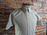 1960s Men's Unworn Fruit of The Loom Mad Men Era Vintage Polyester Blend Light Brown Short Sleeve Shirt by Fruit of the Loom - Size SMALL