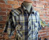 1980s Vintage Rustler Western Shirt Men's Blue & Yellow Plaid Cowboy Style Short Sleeve Shirt with Pearl Snaps - Size XL