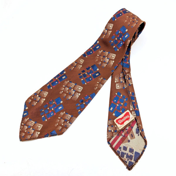 1920s-30s Art Deco Men's Tie Gatsby Era Copper Color Necktie with Blue, Red & Silver Abstract Geometric Woven Designs by Wembley