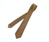 1960s Golden Brown Silk Skinny Tie Narrow Mid Century Men's Vintage All Silk Necktie with embroidered shield design by Beau Brummell