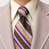 1970s Disco Era Wide Men's Necktie Vintage Brown & Purple 100% Polyester Striped Tie from RS Apparel, Indianapolis, Indiana.