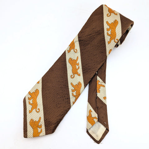 1970s Disco Era Wide Lion Tie Men's Vintage Silk Blend Necktie with Diagonal Bands and Lion designs labeled Alessandro Originals