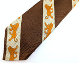 1970s Disco Era Wide Lion Tie Men's Vintage Silk Blend Necktie with Diagonal Bands and Lion designs labeled Alessandro Originals
