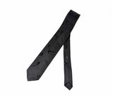 1980s Vintage Black Skinny Tie Men's 80s Narrow Black Tonal Woven Necktie with Abstract Boomerang or Wave Like Designs