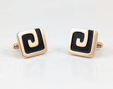 1960s Vintage HICKOK U.S.A. men's cufflinks featuring a striking mid-century modernist design in gold tone and black enamel.