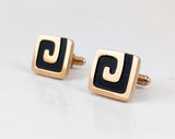 1960s Vintage HICKOK U.S.A. men's cufflinks featuring a striking mid-century modernist design in gold tone and black enamel.